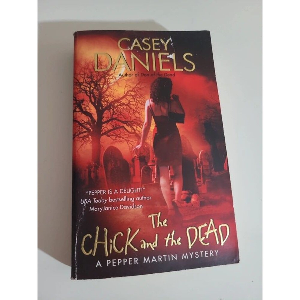 The Chick and the Dead by Casey Daniel's A Pepper Martin Mystery Paperback Novel
